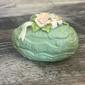 Green porcelain egg shaped trinket dish